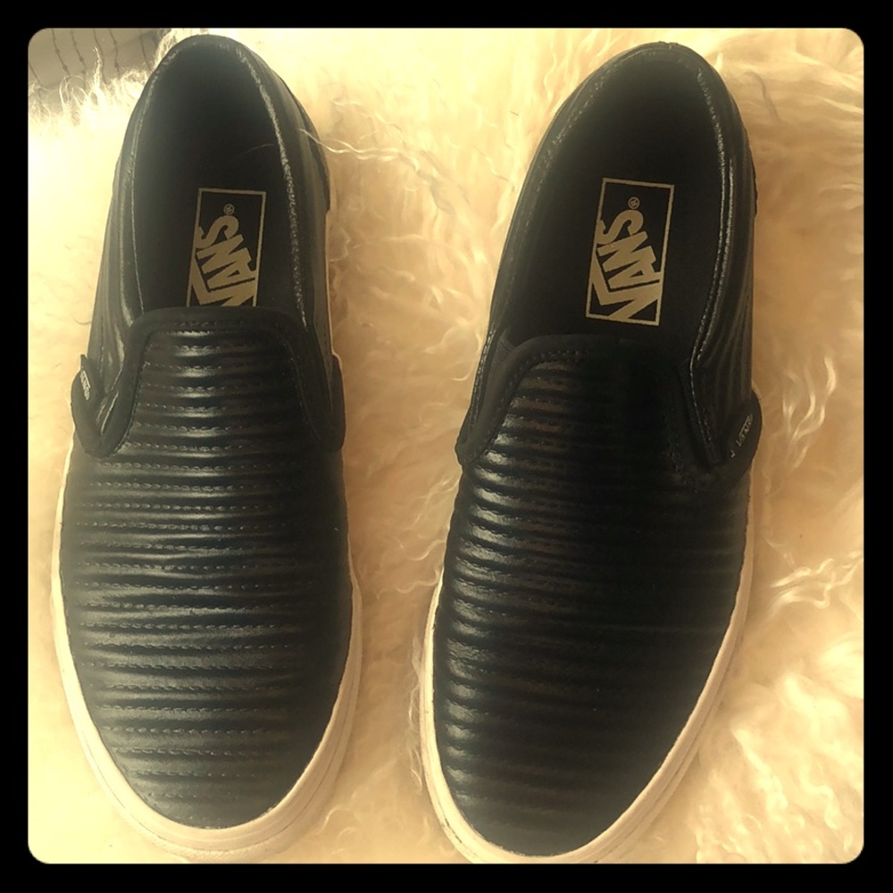Rare pair Vans black leather loafers.